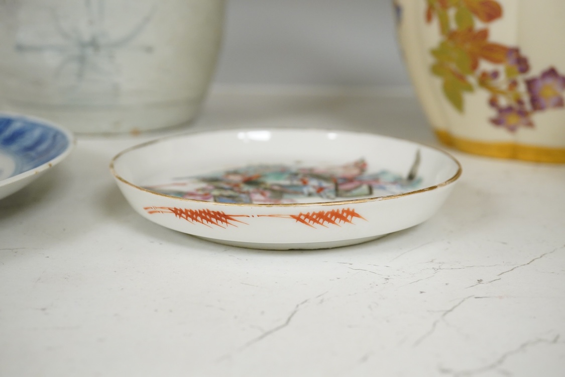 A 19th Century Chinese blue and white ‘precious objects’ plate, a jar and famille rose saucer, largest 23cm in diameter
